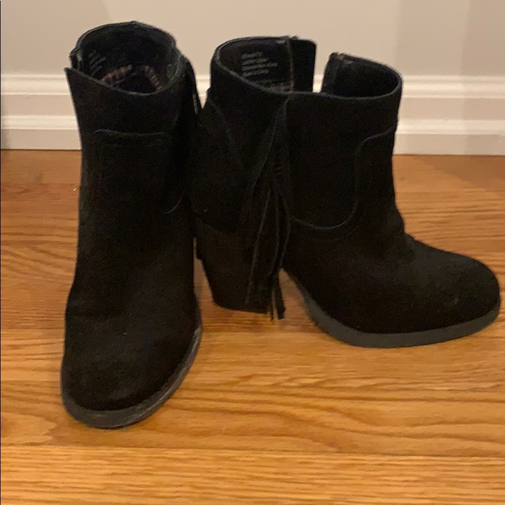 Black suede booties with fringe detail